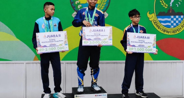 Rahendra Bimantara Borong 2 Emas O2SN Nasional 2026 Caption: Rahendra Bimantara, siswa SDN Kauman 1 Bojonegoro, meraih dua medali emas cabang renang pada O2SN Nasional 2026 di Jakarta.
